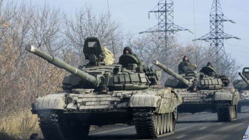 Ополченцы на Украине отвели большинство тяжелых вооружений - ảnh 1